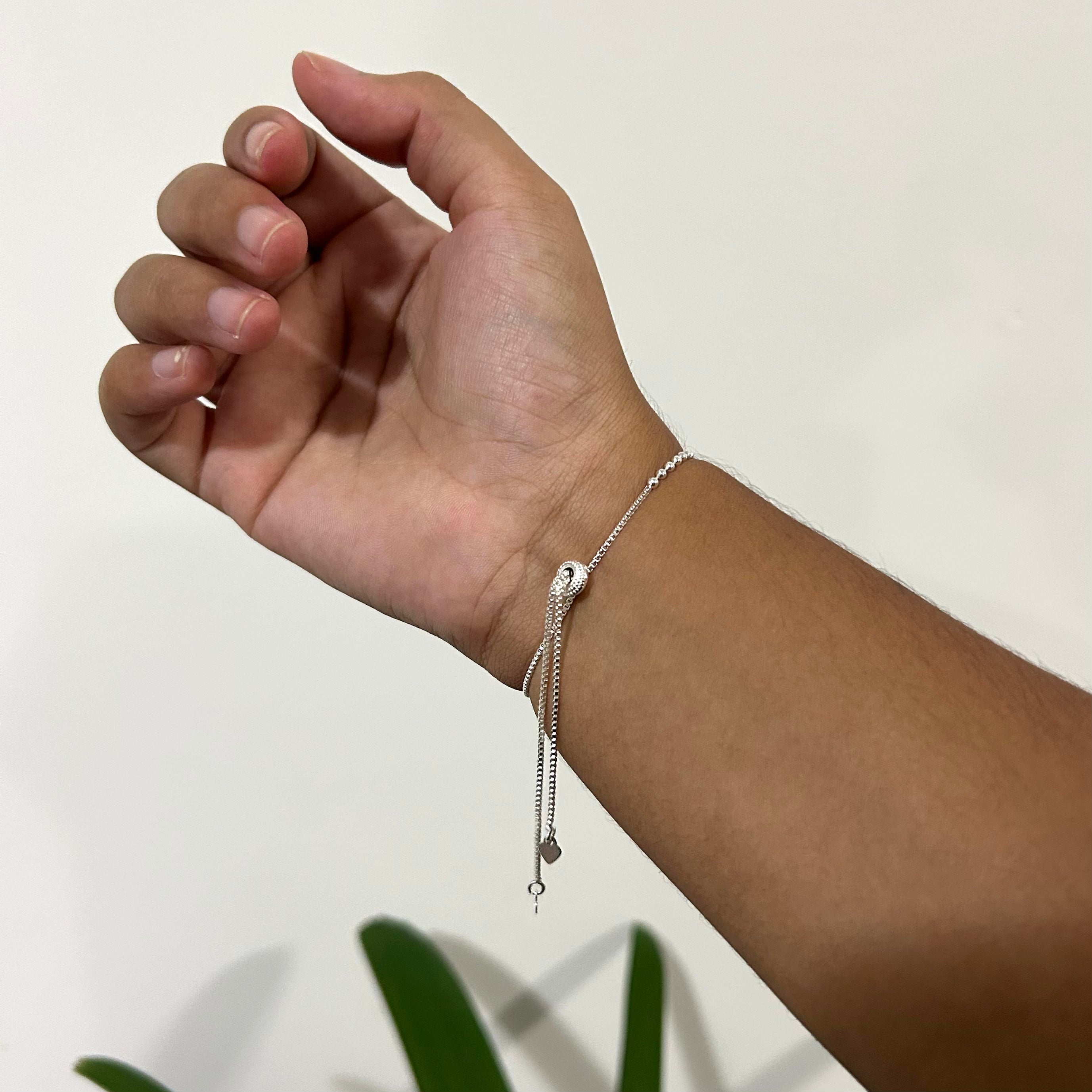 Pulseira bolinhas com limitador banhada em prata 925